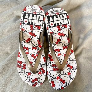 Super cute vintage Hello Kitty Sanrio mini wedge flip flops.